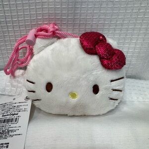 Hello Kitty face shaped bag.  Sequin Bow, White and Pink